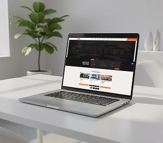 Travora HubSpot theme shown on a laptop